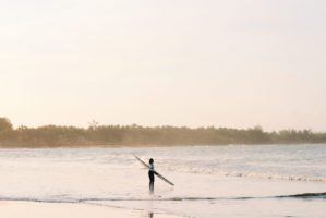 surfing beach sea