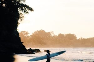 surfing beach sea